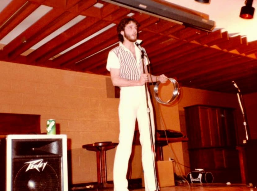 Eric Thompson takes the stage with his trusty microphone, ready to work his magic and charm another audience with his signature blend of comedy and entertainment.