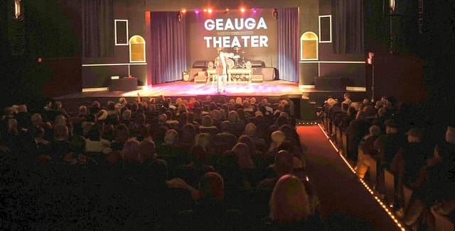 Eric Thompson commands the stage at the beautiful Geauga Theater, with a packed house hanging on his every word during what looks like an intimate yet energetic evening of comedy and magic.