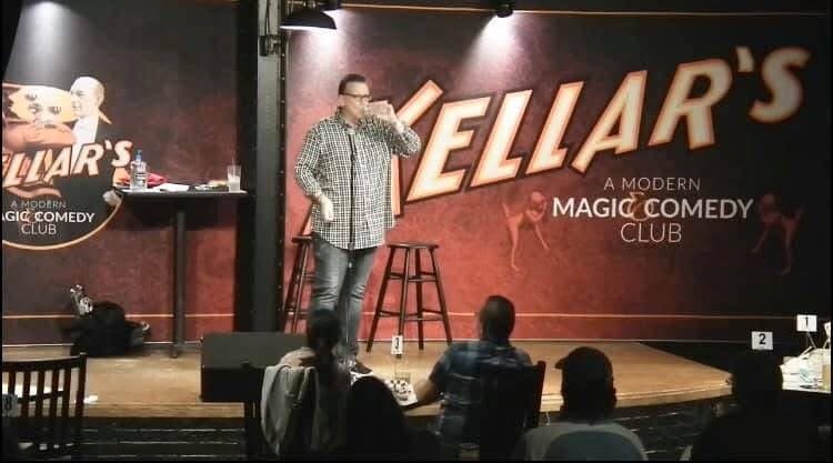 Eric Thompson commands the stage at Kellar's Modern Magic Comedy Club, delivering his signature blend of comedy and magic to an intimate audience in this classic club setting.