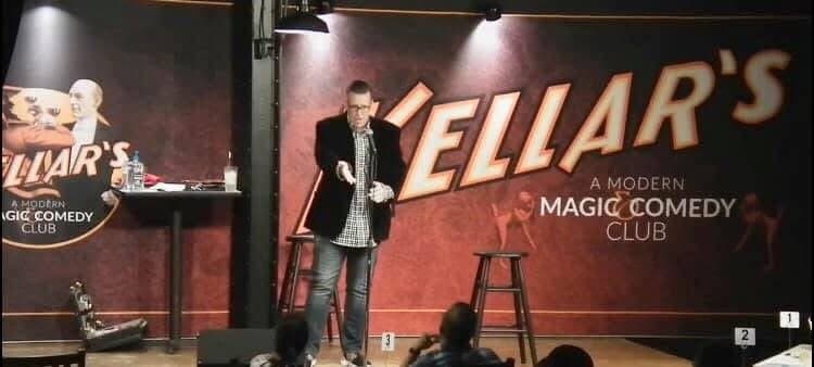 Eric Thompson commands the stage at Hellar's Magic Comedy Club, delivering his signature blend of comedy and magic to an intimate audience in this cozy venue.