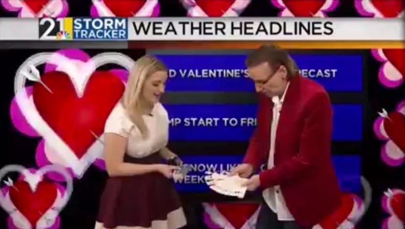 Eric Thompson brings his signature charm to a Valentine's Day weather broadcast, proving his versatility extends beyond the comedy stage to television appearances with festive flair.