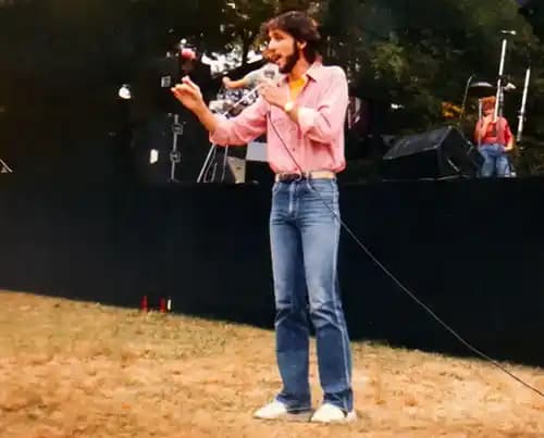 Young Eric Thompson performing stand-up