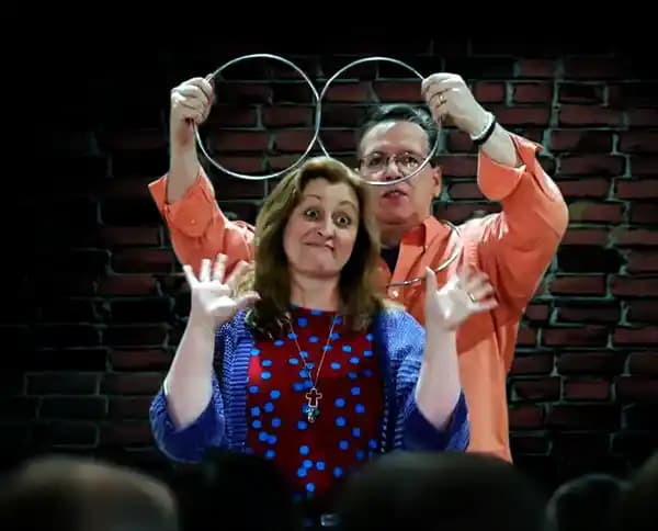 Eric Thompson combining comedy and magic on stage